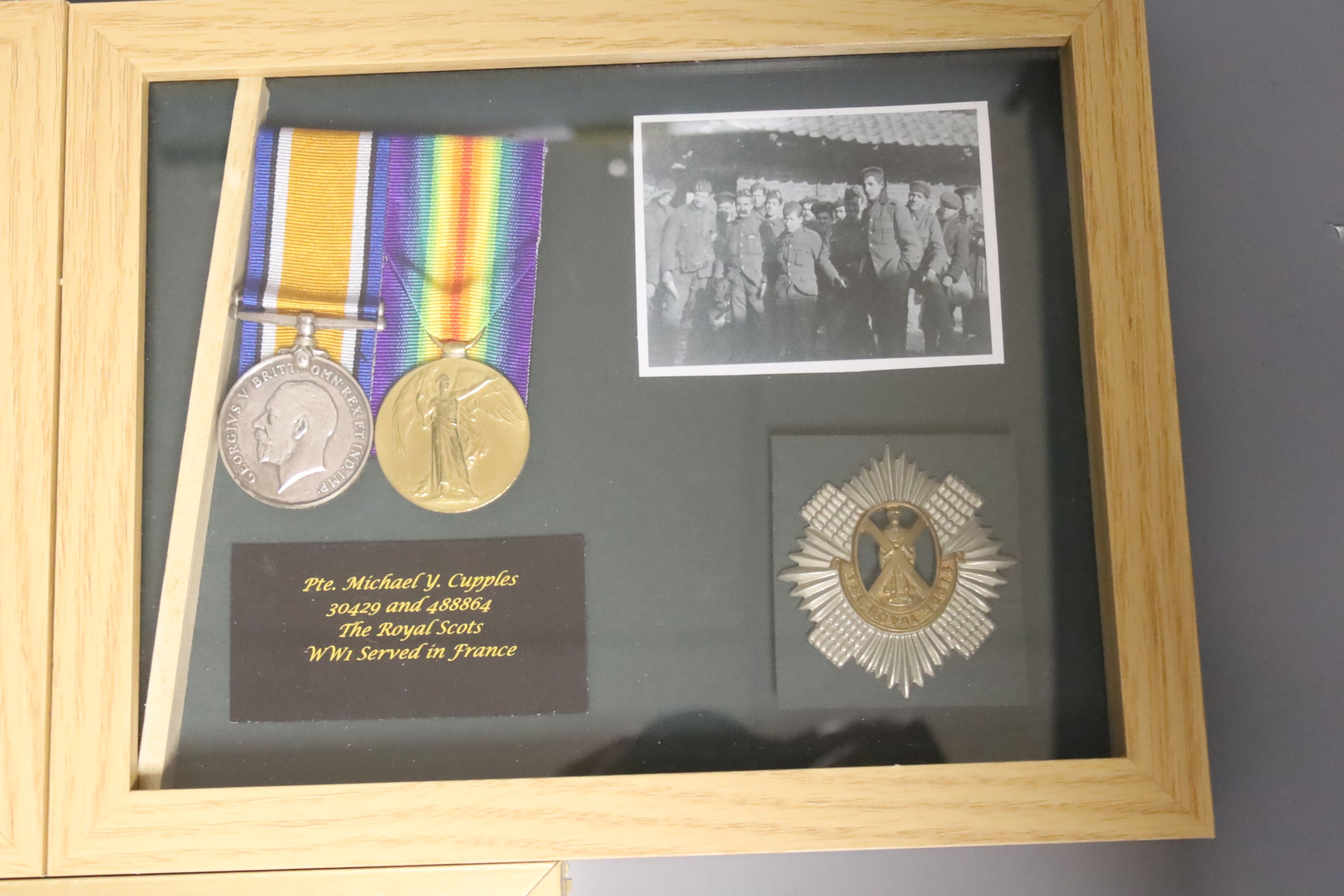 Three framed WW1 medal groups